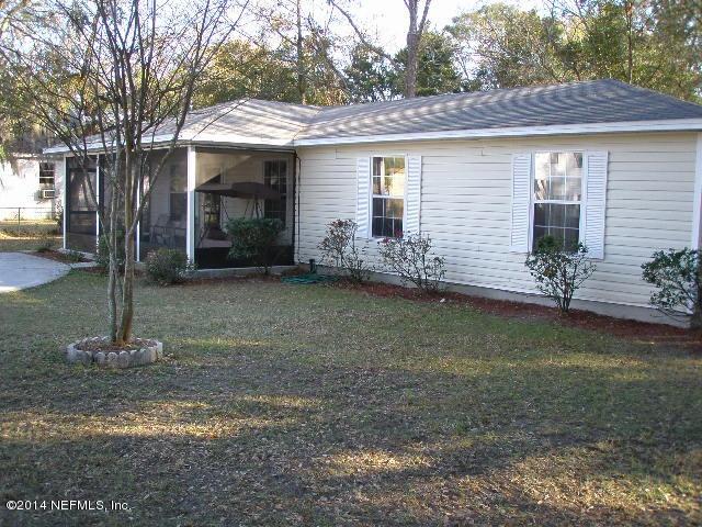 2070 Benedict Road Jacksonville, FL 32209 - Photo 8 of 38 a view of a house with backyard and garden