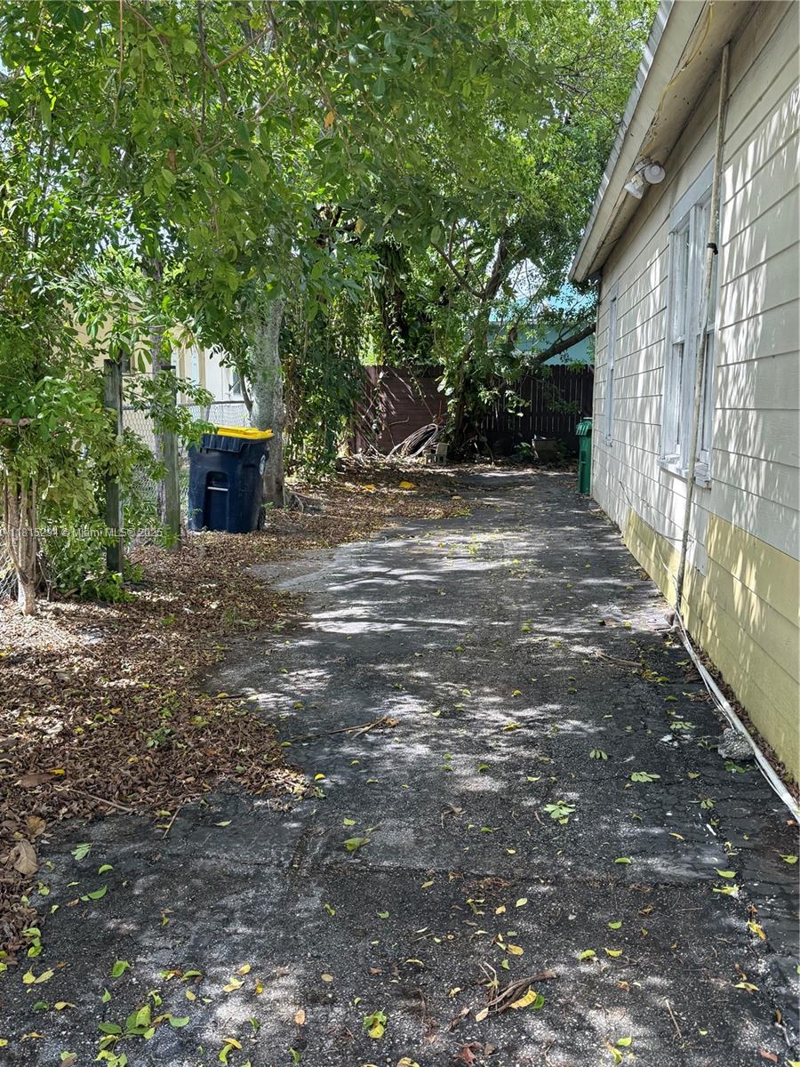 213 Stirling Road Dania Beach, FL 33004 - Photo 11 of 12 a view of house with outdoor space