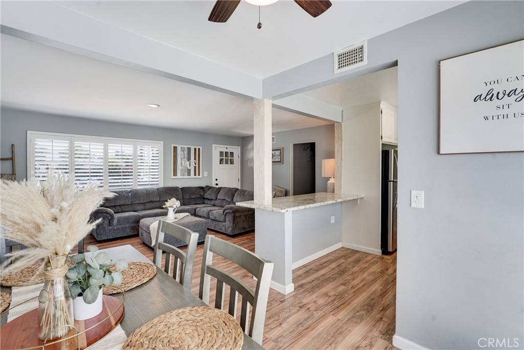 5734 Mountain View Avenue Riverside, CA 92504 - Photo 14 of 28 a living room with furniture and a flat screen tv