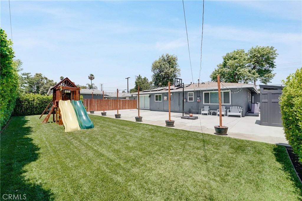 5734 Mountain View Avenue Riverside, CA 92504 - Photo 25 of 28 a house view with a sitting space and garden