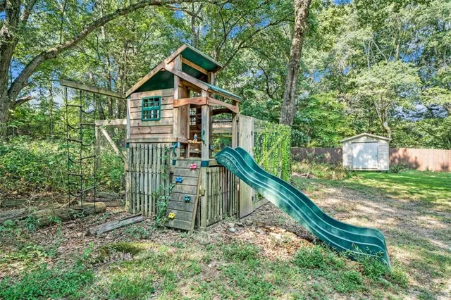 a backyard of a house with lots of green space