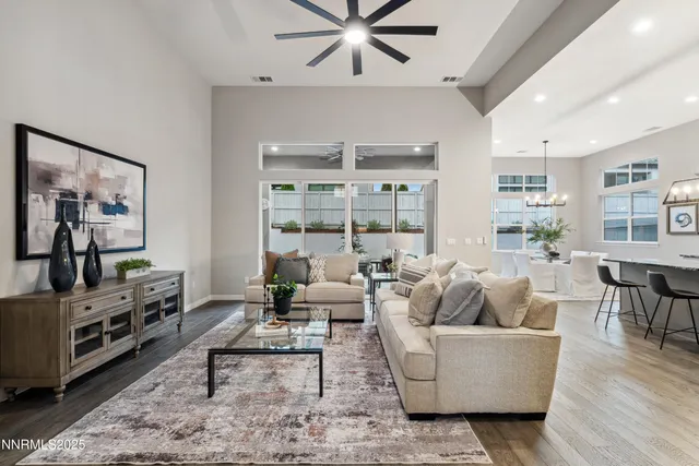 a large white bathroom with a granite countertop sink mirror and bathtub