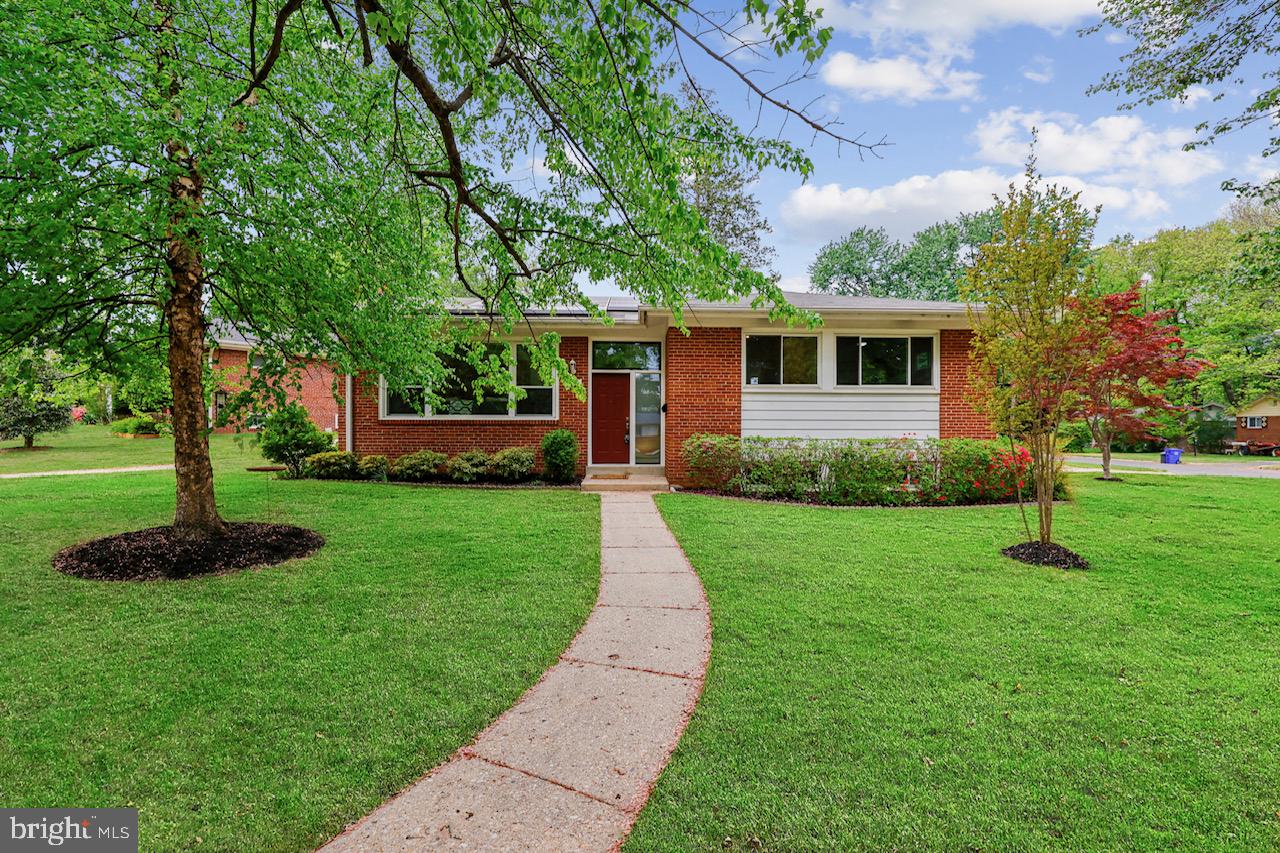 1901 Ladd Street Silver Spring, MD 20902 - Photo 1 of 101 a front view of house with yard and green space