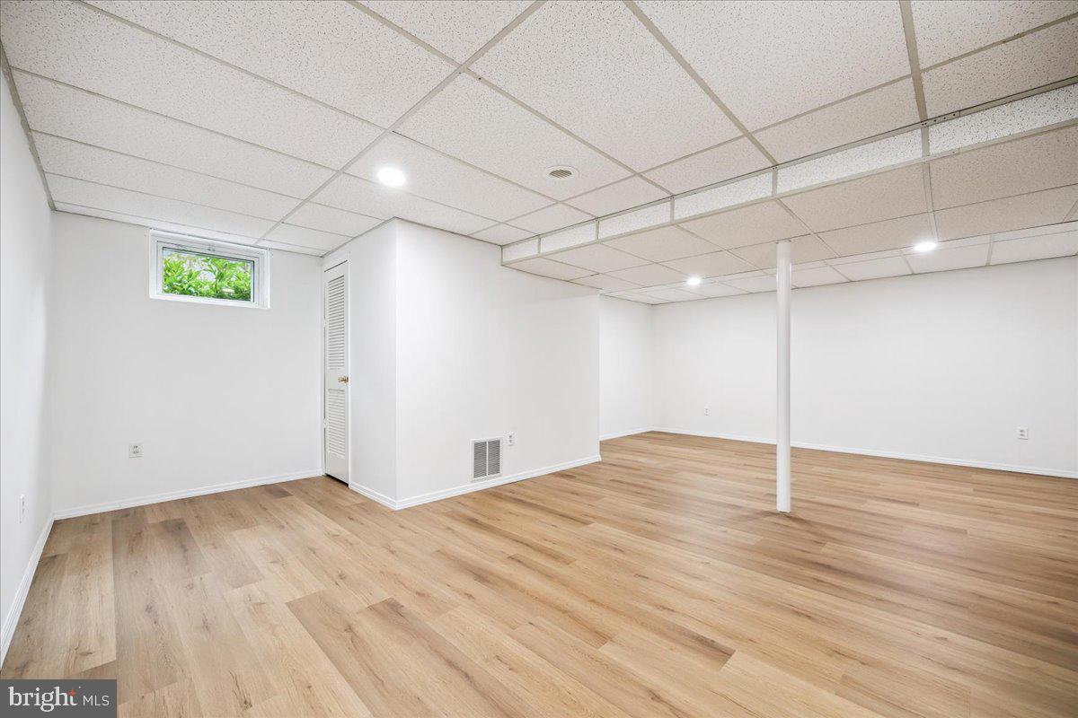 1901 Ladd Street Silver Spring, MD 20902 - Photo 15 of 101 a view of empty room with wooden floor
