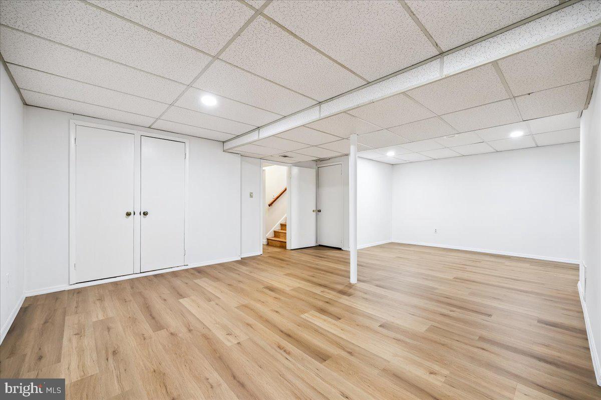1901 Ladd Street Silver Spring, MD 20902 - Photo 60 of 101 a view of an empty room with wooden floor