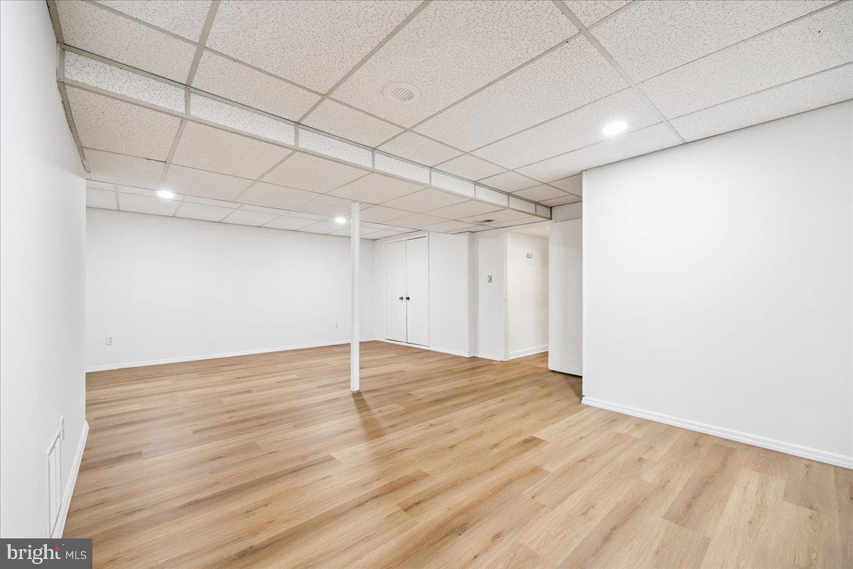 1901 Ladd Street Silver Spring, MD 20902 - Photo 61 of 101 an empty room with wooden floor