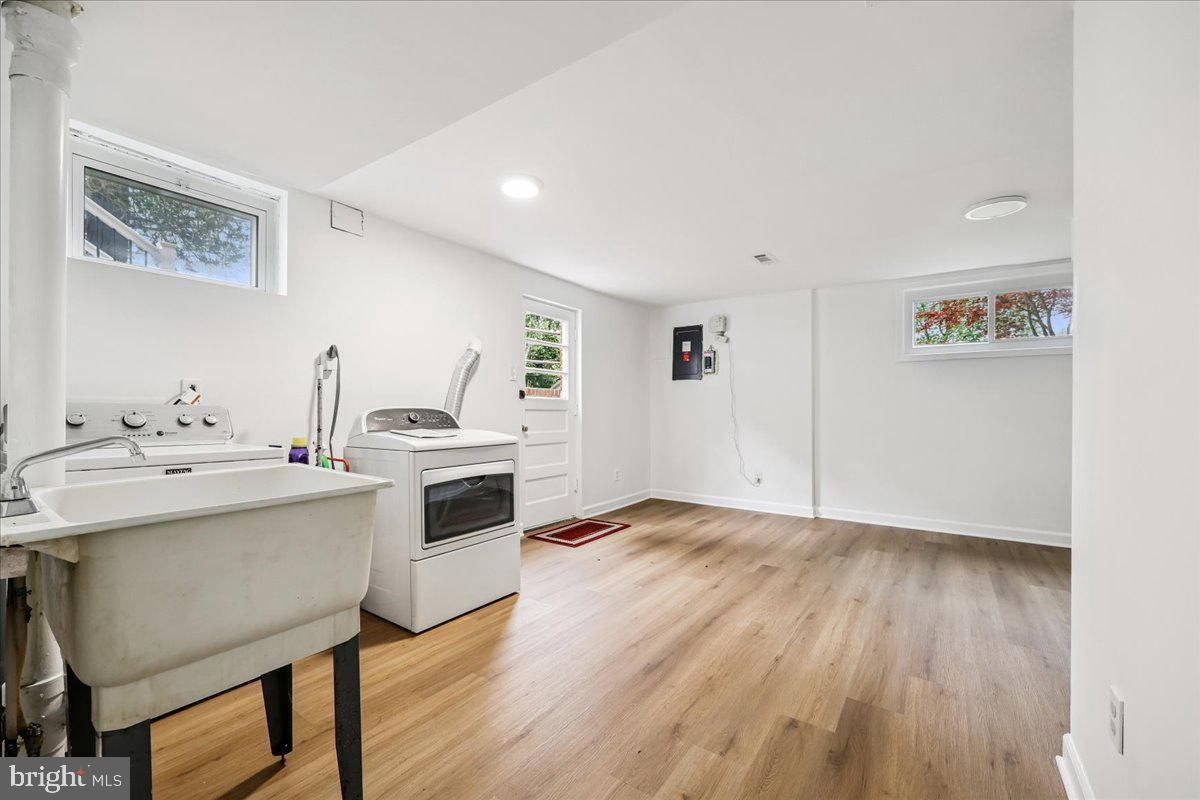 1901 Ladd Street Silver Spring, MD 20902 - Photo 65 of 101 a kitchen with a sink cabinets and wooden floor