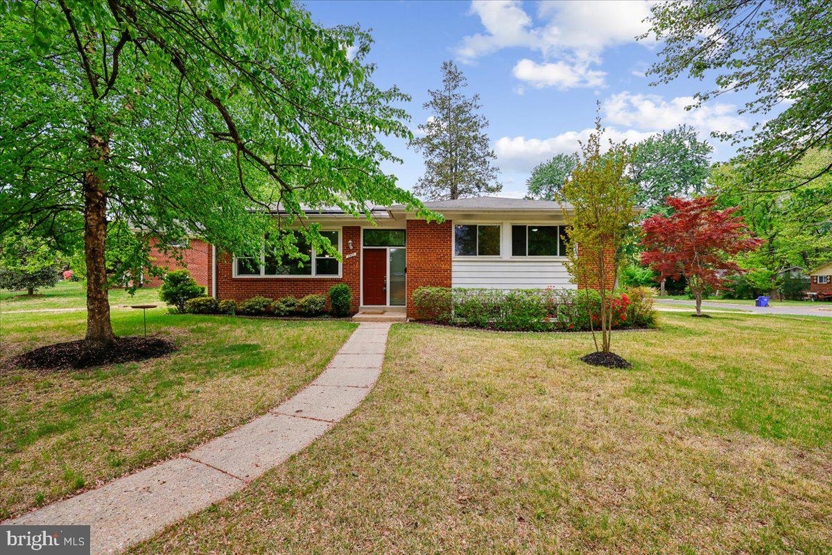 1901 Ladd Street Silver Spring, MD 20902 - Photo 74 of 101 a house with garden in front of it
