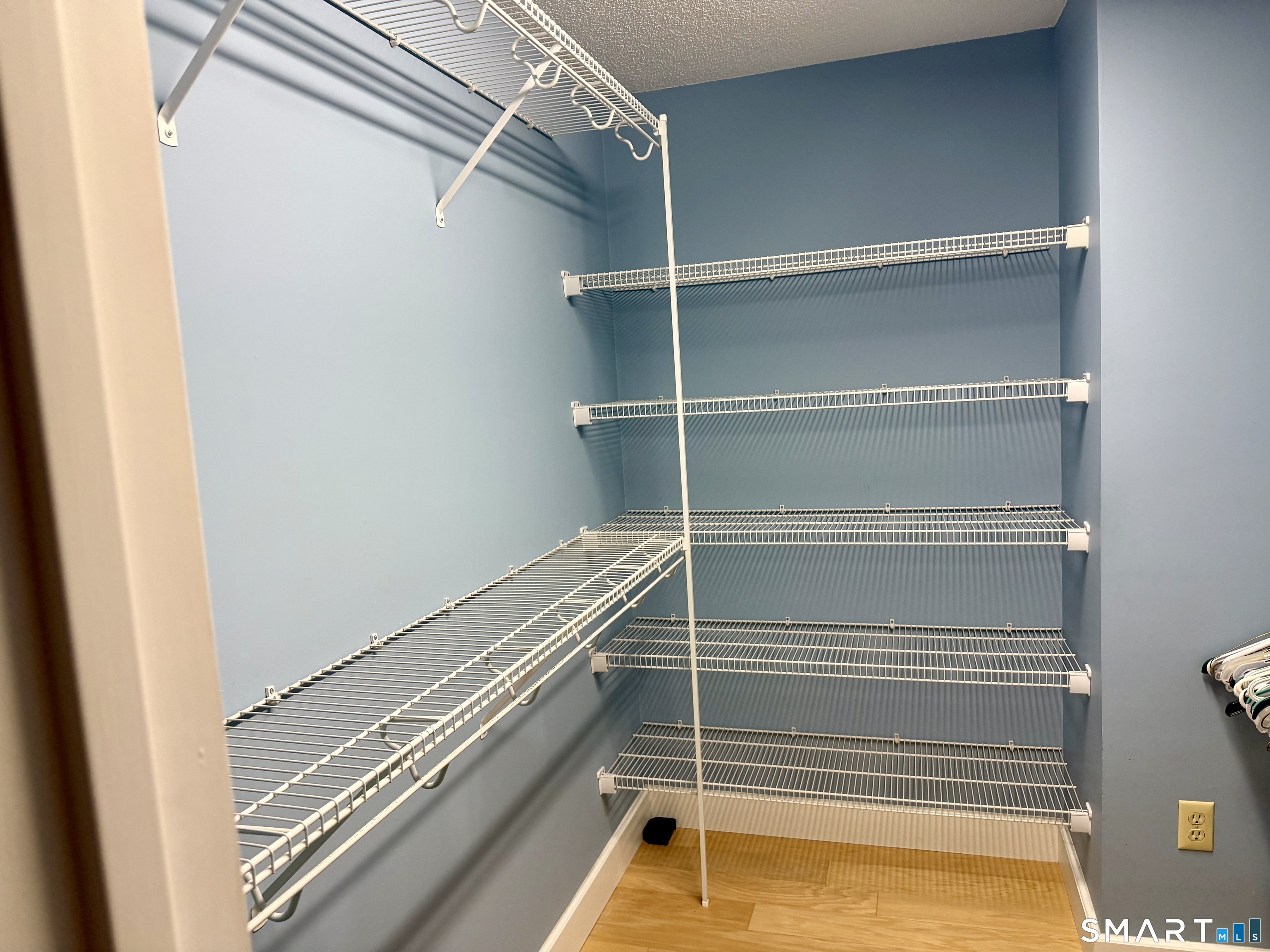 204 Pine Hollow Road Killingly, CT 06241 - Photo 16 of 20 Storage is no problem with this generously sized walk-in closet. Extensive shelving and hanging space provide plenty of room to keep clothing, linens and everyday necessities neatly organized.