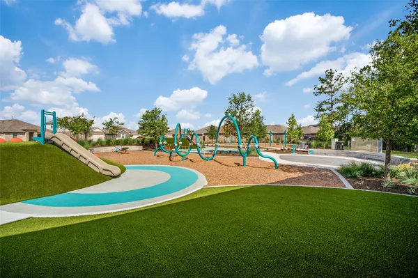 a view of outdoor space with swimming pool and seating