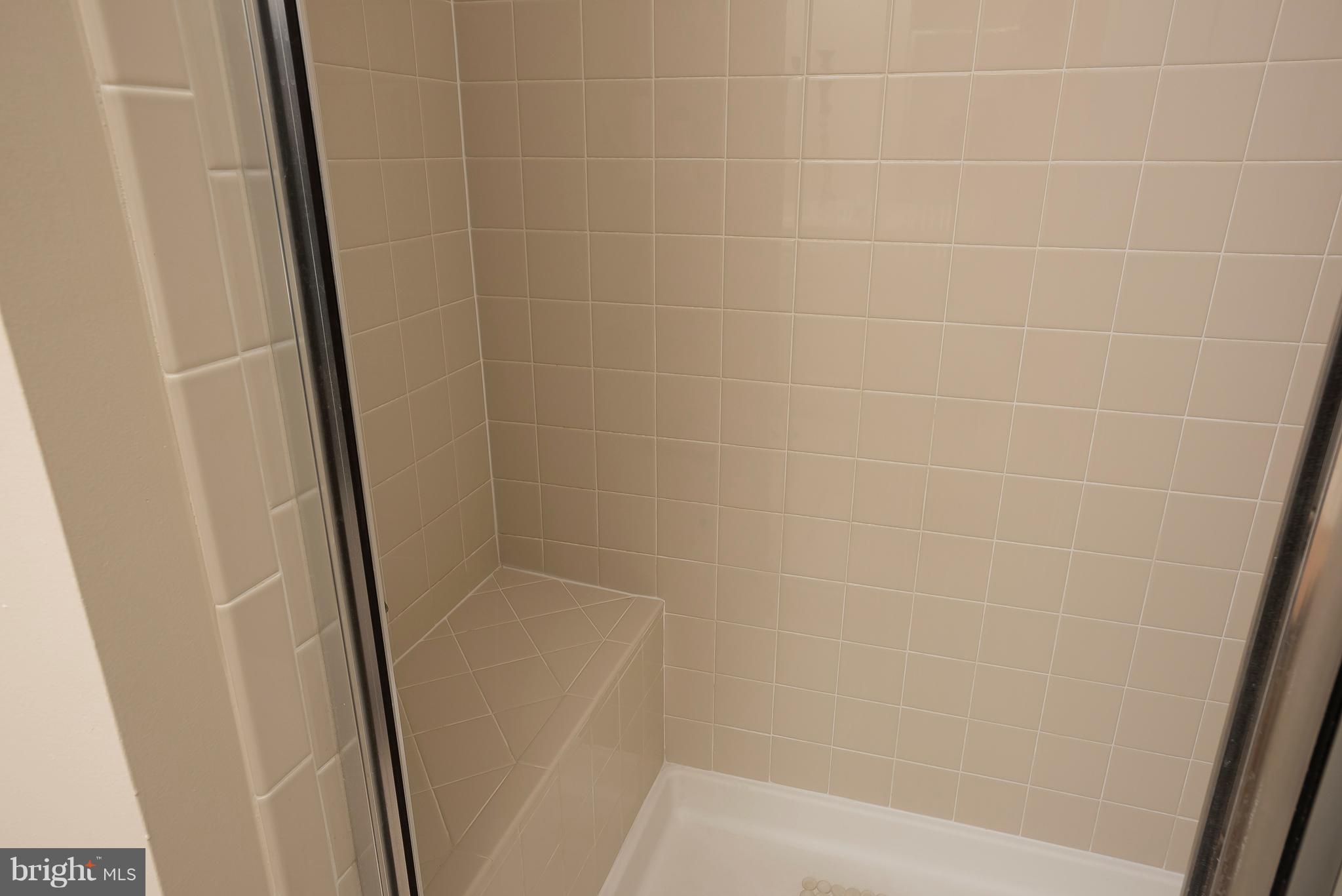 7325 Brookview Road, Unit 405 Elkridge, MD 21075 - Photo 23 of 37 Master Bathroom Built In Shower Seat