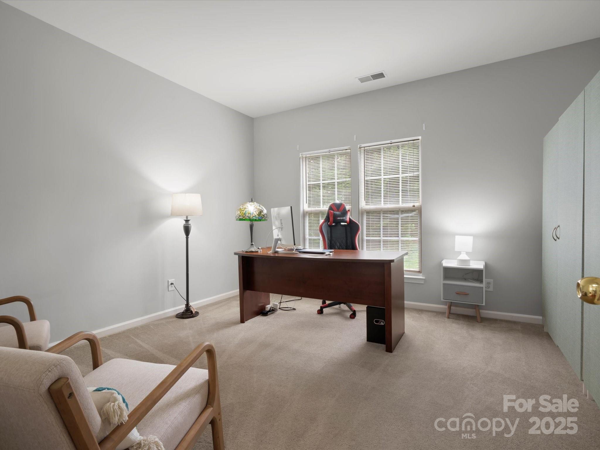 809 Circle Trace Road Monroe, NC 28110 - Photo 11 of 47 a bedroom with furniture and a large window