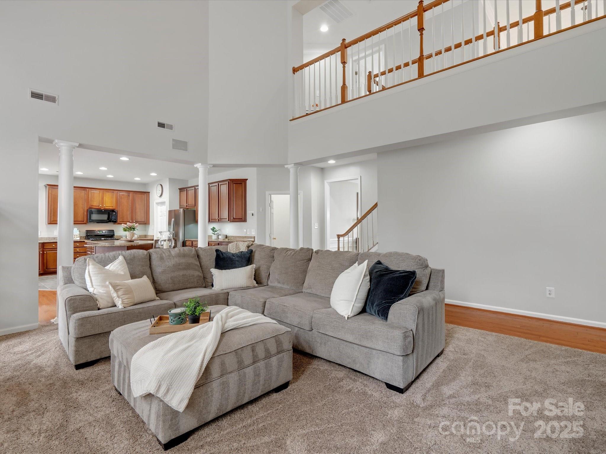 809 Circle Trace Road Monroe, NC 28110 - Photo 14 of 47 a living room with furniture and view of kitchen