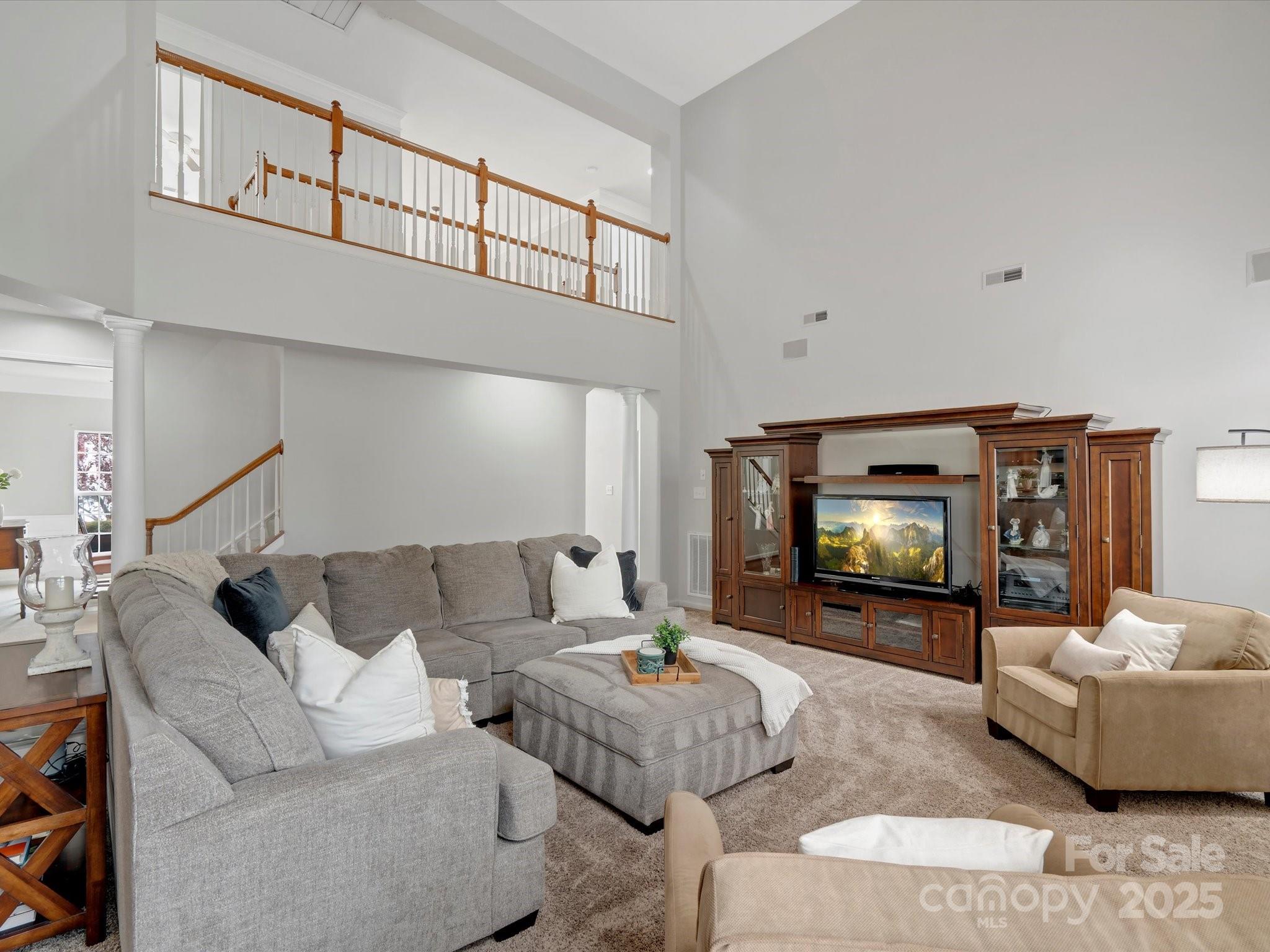 809 Circle Trace Road Monroe, NC 28110 - Photo 15 of 47 a living room with furniture and a flat screen tv
