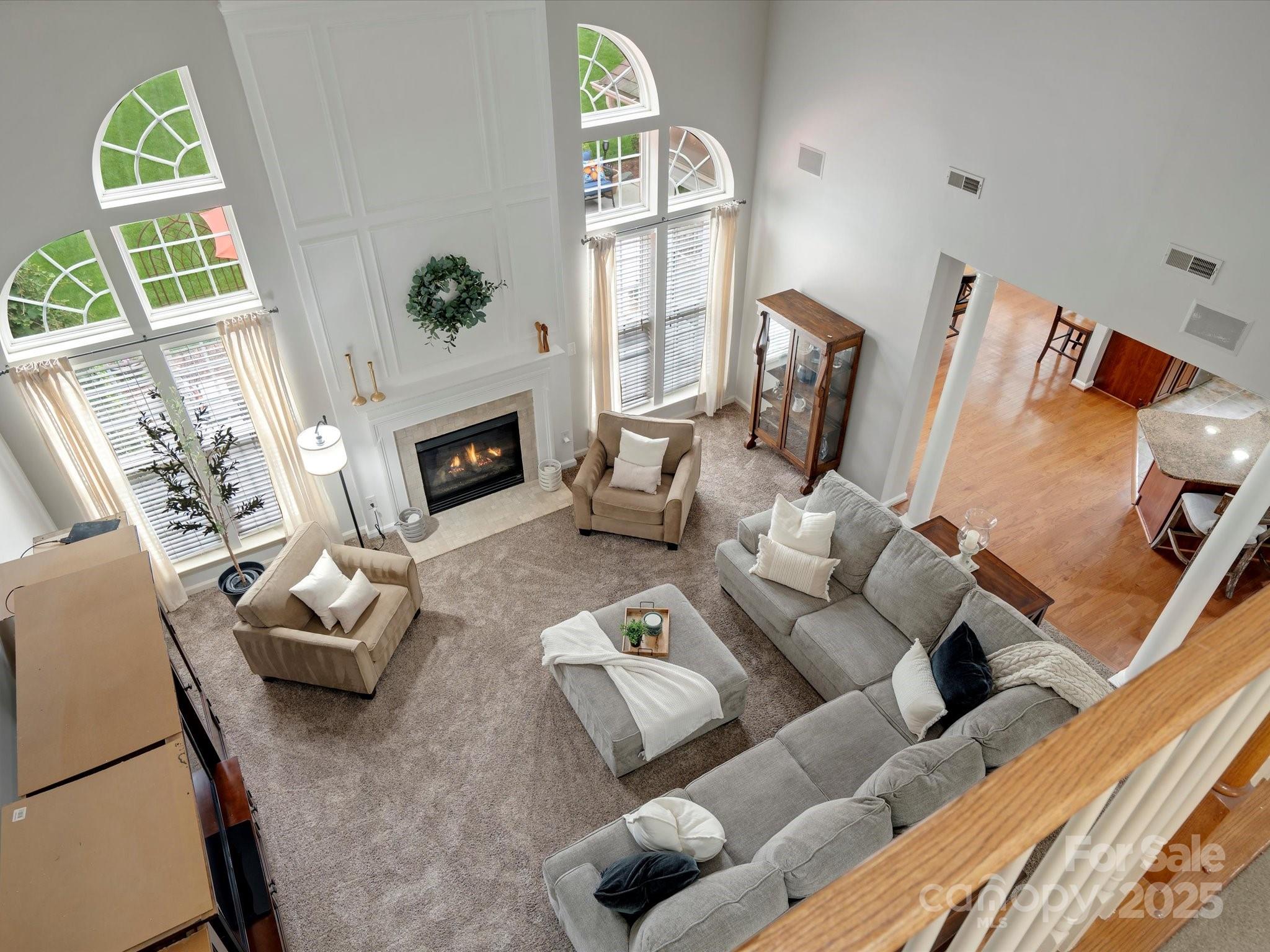 809 Circle Trace Road Monroe, NC 28110 - Photo 17 of 47 a living room with furniture and a fireplace