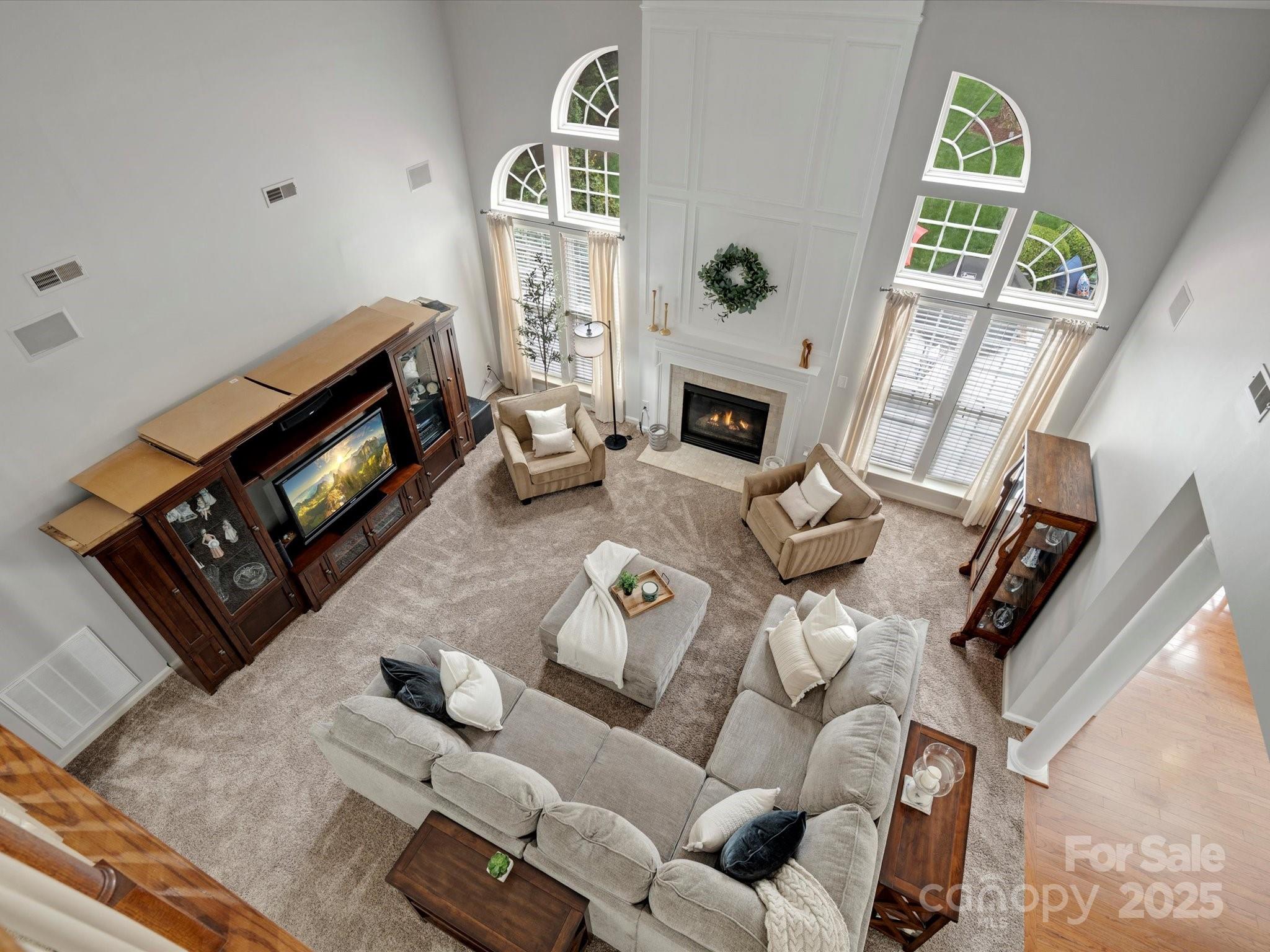 809 Circle Trace Road Monroe, NC 28110 - Photo 18 of 47 a living room with furniture and a fireplace