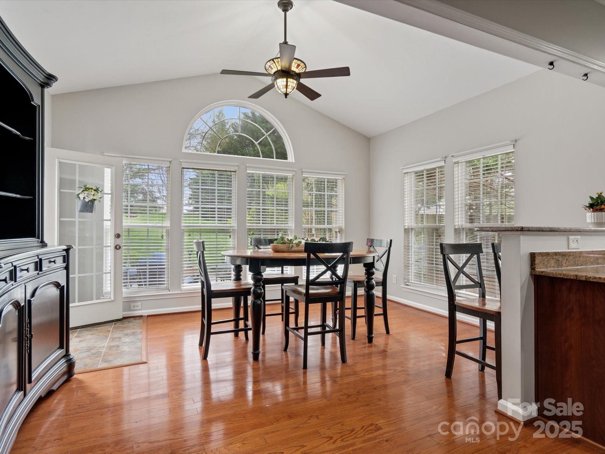 809 Circle Trace Road Monroe, NC 28110 - Photo 25 of 47 a view of a dining room with furniture window and wooden floor