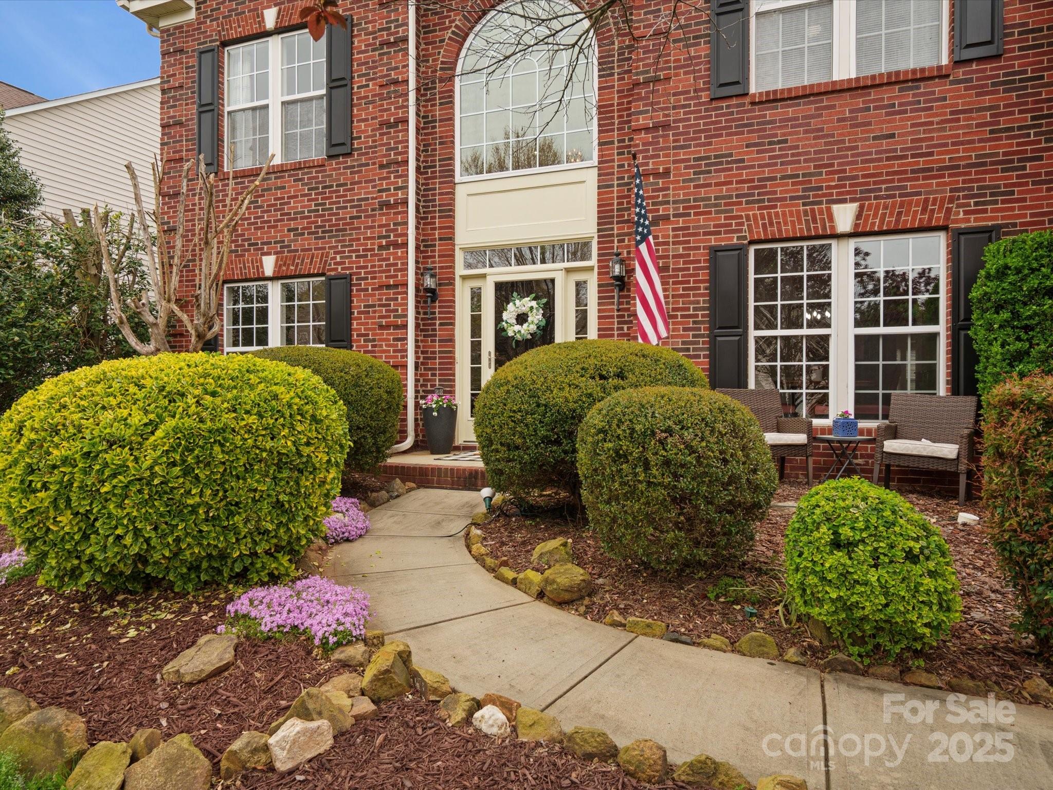 809 Circle Trace Road Monroe, NC 28110 - Photo 3 of 47 a view of a backyard with potted plants