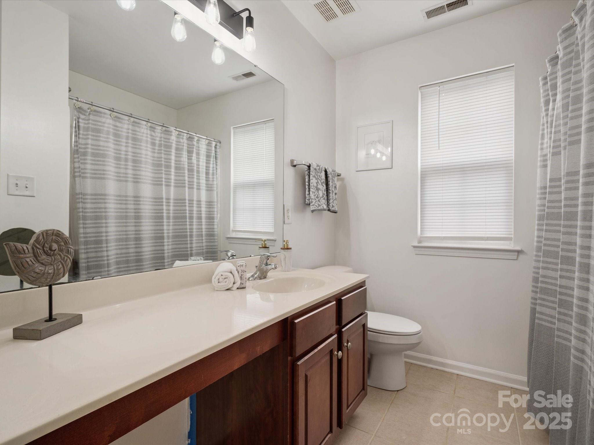 809 Circle Trace Road Monroe, NC 28110 - Photo 36 of 47 a bathroom with a sink toilet and shower