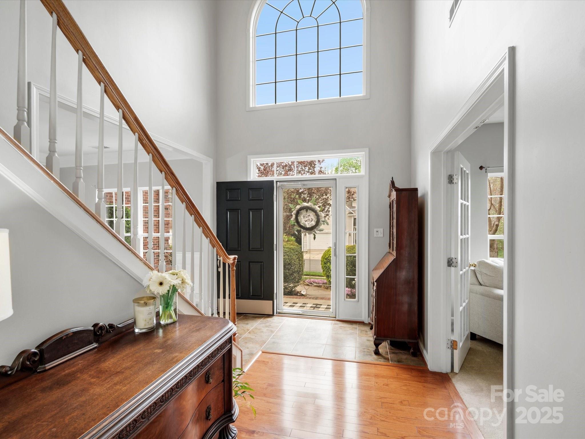 809 Circle Trace Road Monroe, NC 28110 - Photo 5 of 47 a view of an entryway with wooden floor and windows