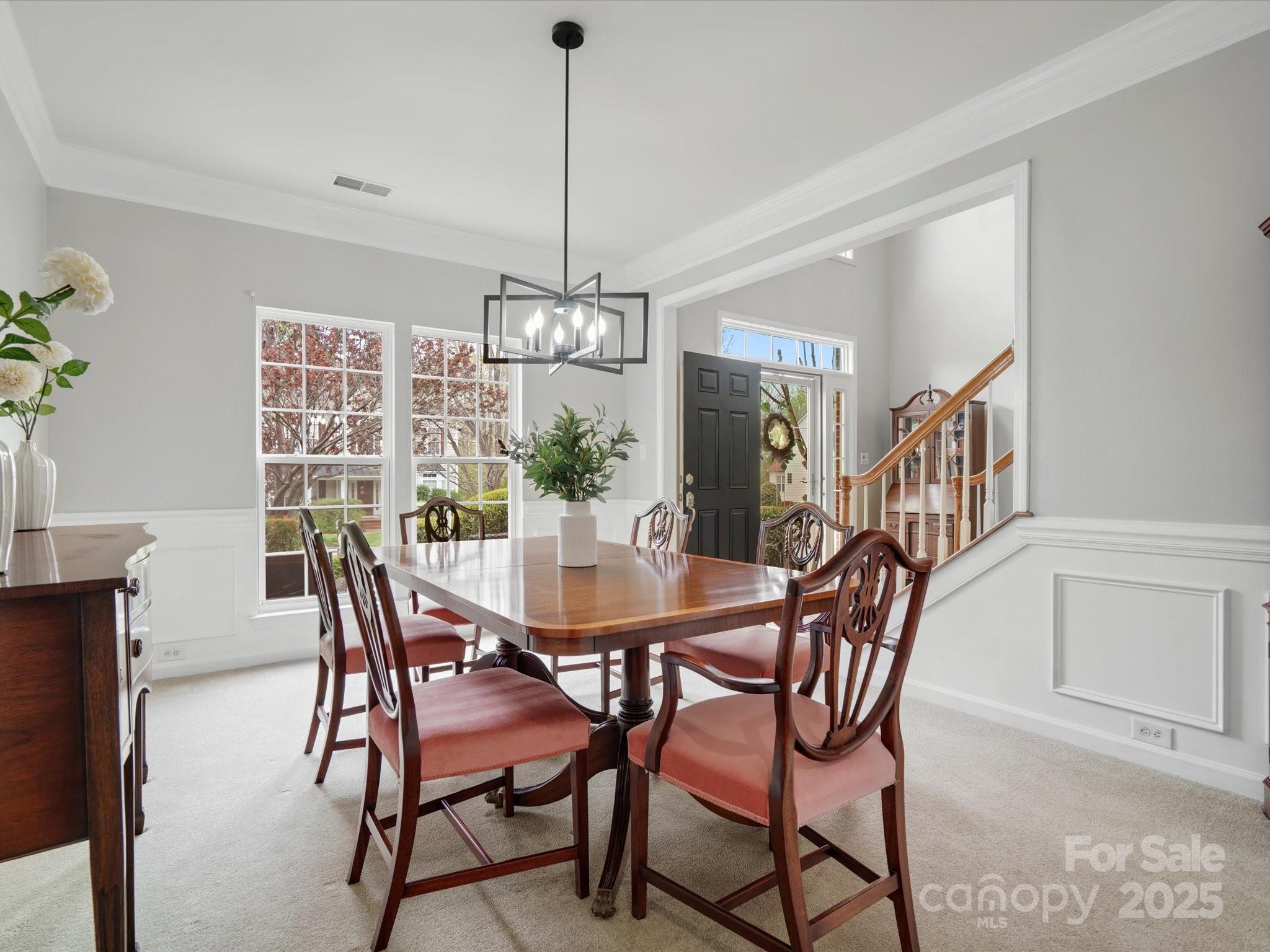809 Circle Trace Road Monroe, NC 28110 - Photo 7 of 47 a view of a dining room with furniture window and wooden floor