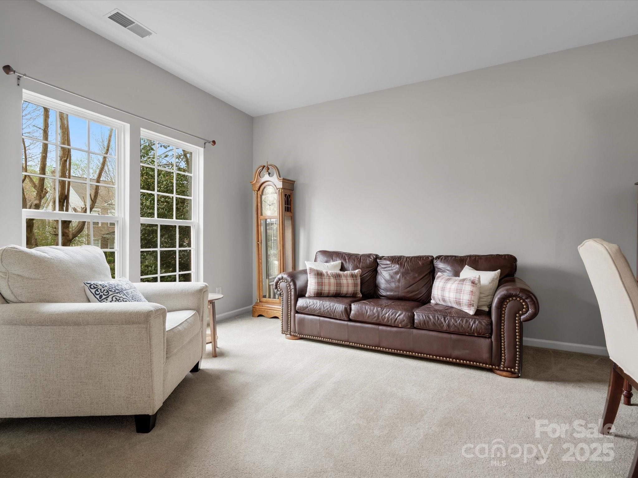 809 Circle Trace Road Monroe, NC 28110 - Photo 10 of 47 a living room with furniture and a large window
