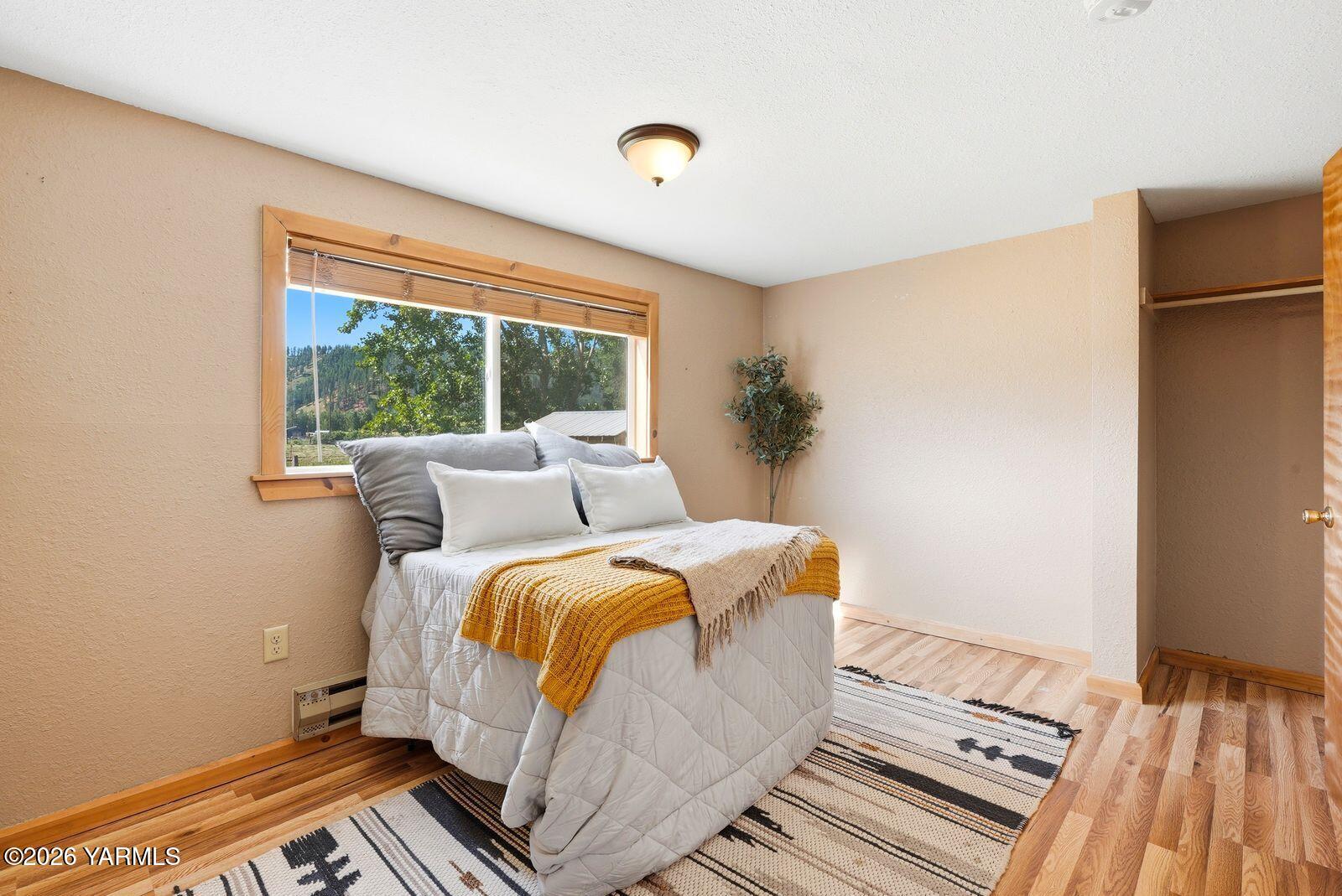 3780 Nile Road Naches, WA 98937 - Photo 19 of 43 a bed room with a bed and a window
