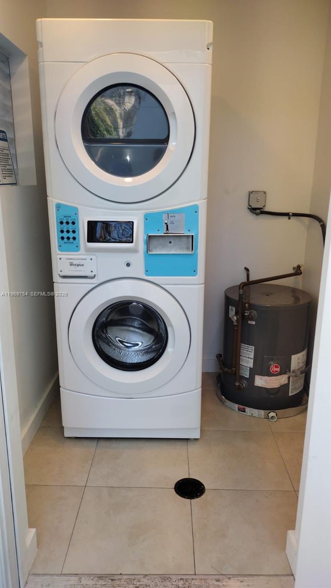 741 Northwest 60th Street, Unit 3 Miami, FL 33127 - Photo 14 of 15 a utility room with dryer and washer