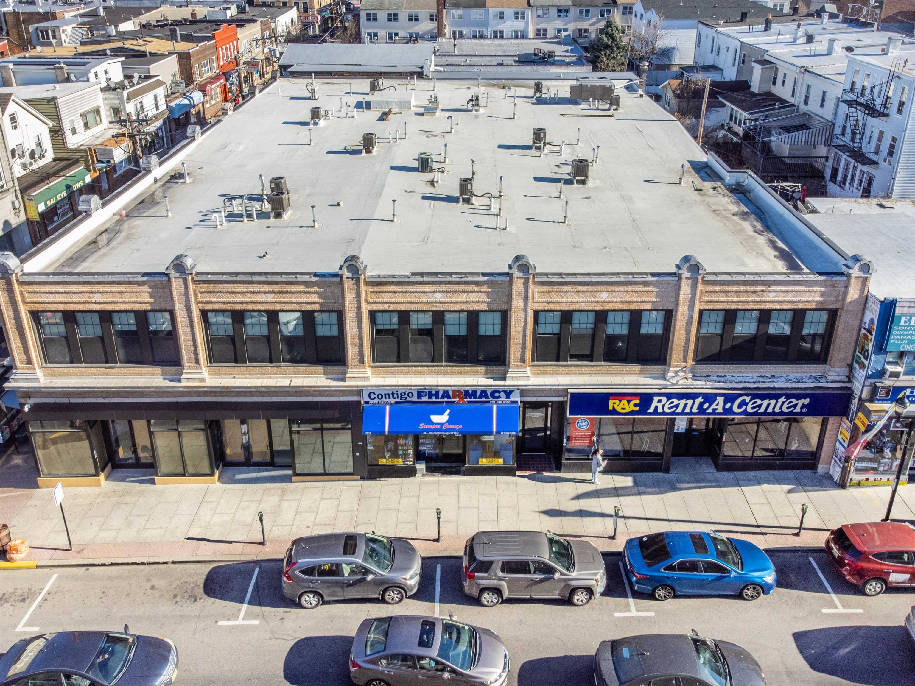 3510 Bergenline Avenue, Unit 205 Union City, NJ 07087 - Photo 10 of 21 a building outdoor space with lots of traffic lights