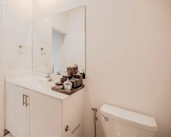 a bathroom with a sink and a toilet