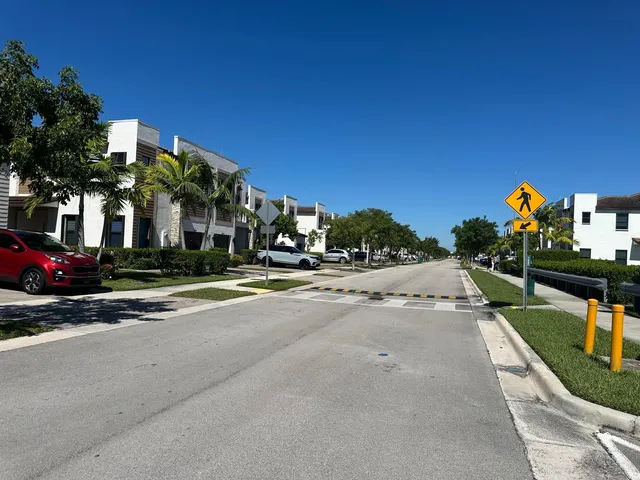 a view of a street with houses