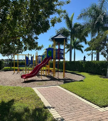 a view of a park with a slide