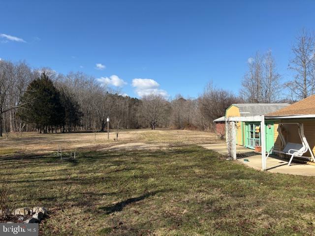 4928 Bethlehem Road Preston, MD 21655 - Photo 11 of 19 a view of a house with a yard
