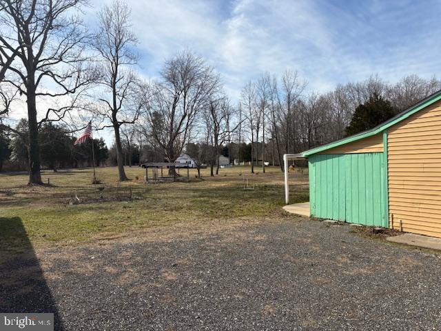 4928 Bethlehem Road Preston, MD 21655 - Photo 12 of 19 a view of a field with large trees