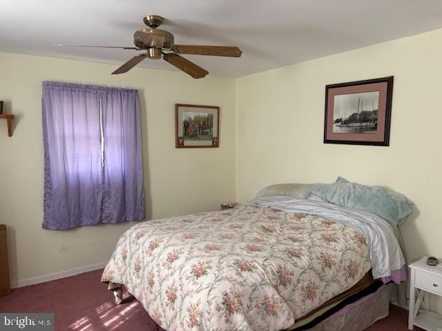 4928 Bethlehem Road Preston, MD 21655 - Photo 6 of 19 a bedroom with a bed and a painting on the wall