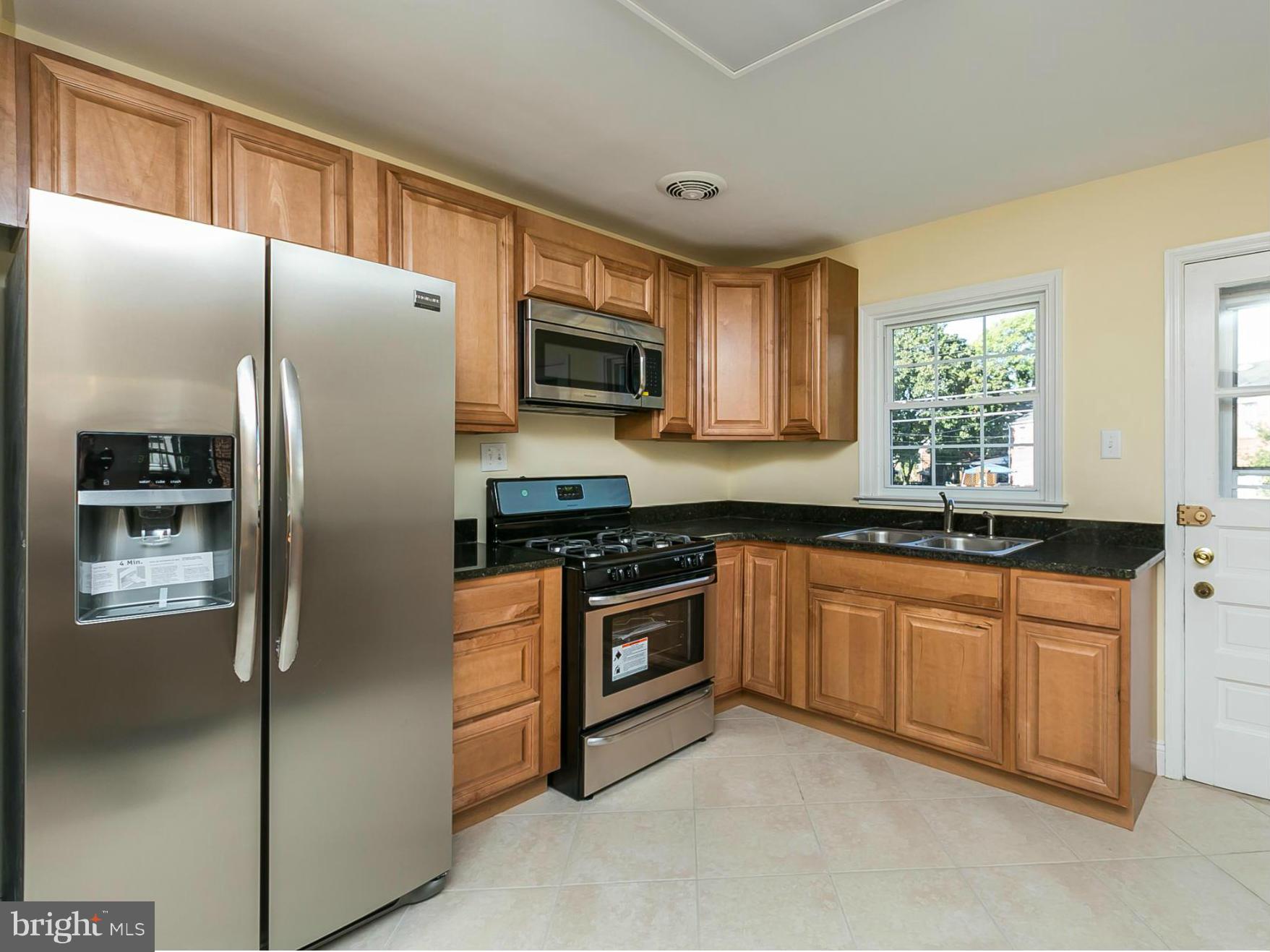 1731 Edgewood Road Baltimore, MD 21286 - Photo 9 of 30 Kitchen with stainless steel appliances!