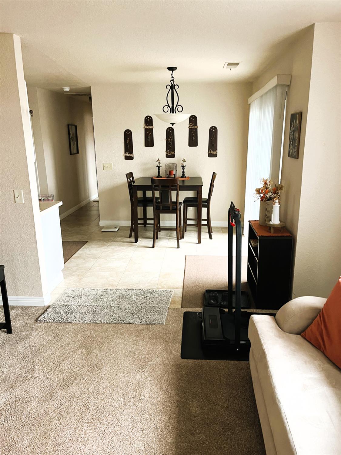113 Atkinson Street Roseville, CA 95678 - Photo 4 of 22 a view of a livingroom with furniture and entryway
