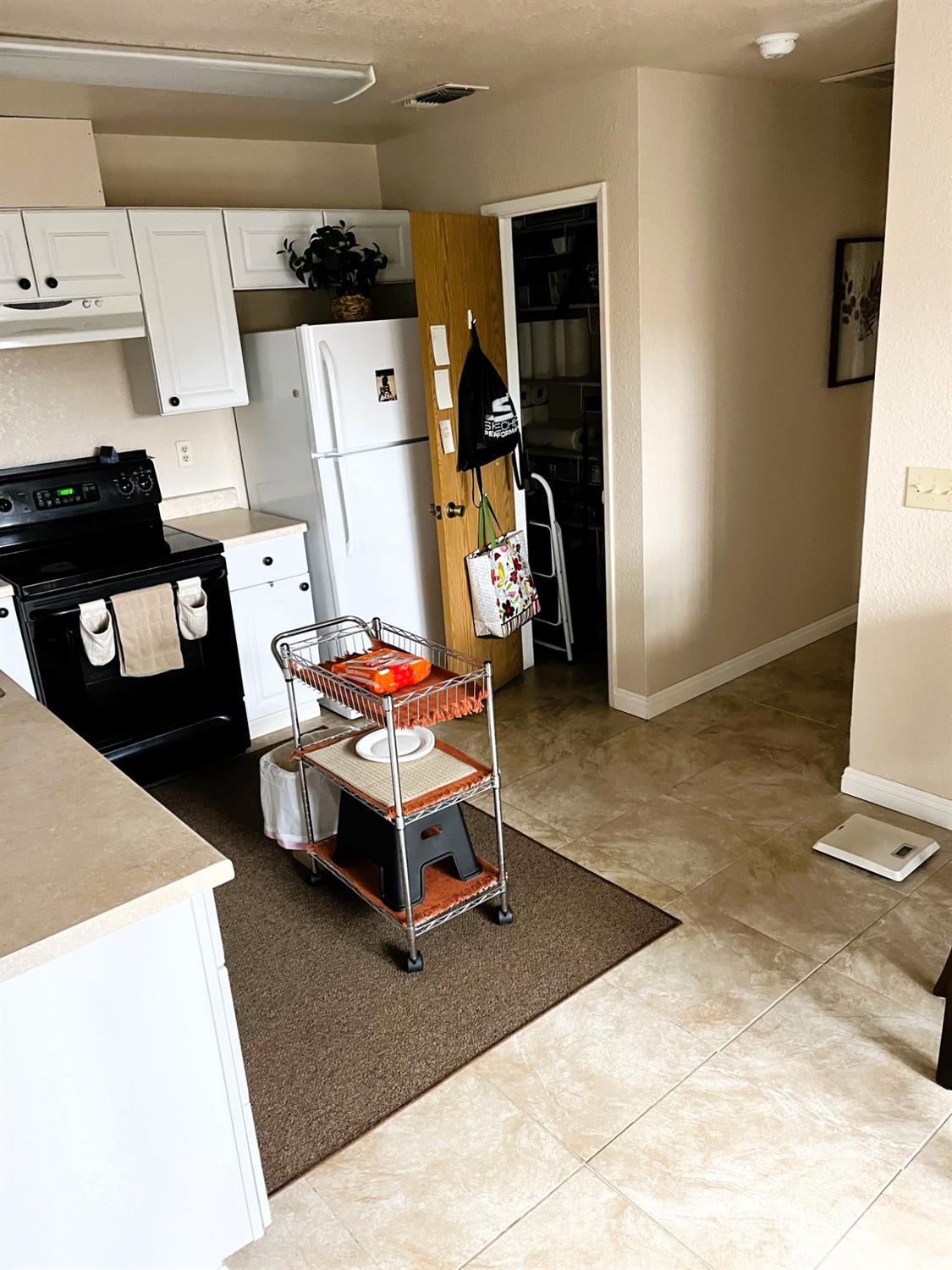 113 Atkinson Street Roseville, CA 95678 - Photo 9 of 22 a living room with furniture and a table