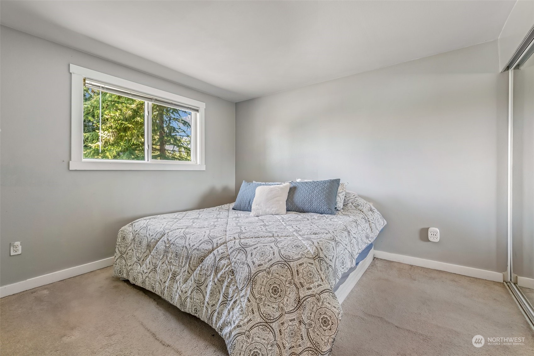 612 219th Place Southwest Bothell, WA 98021 - Photo 14 of 32 a bedroom with a bed and window