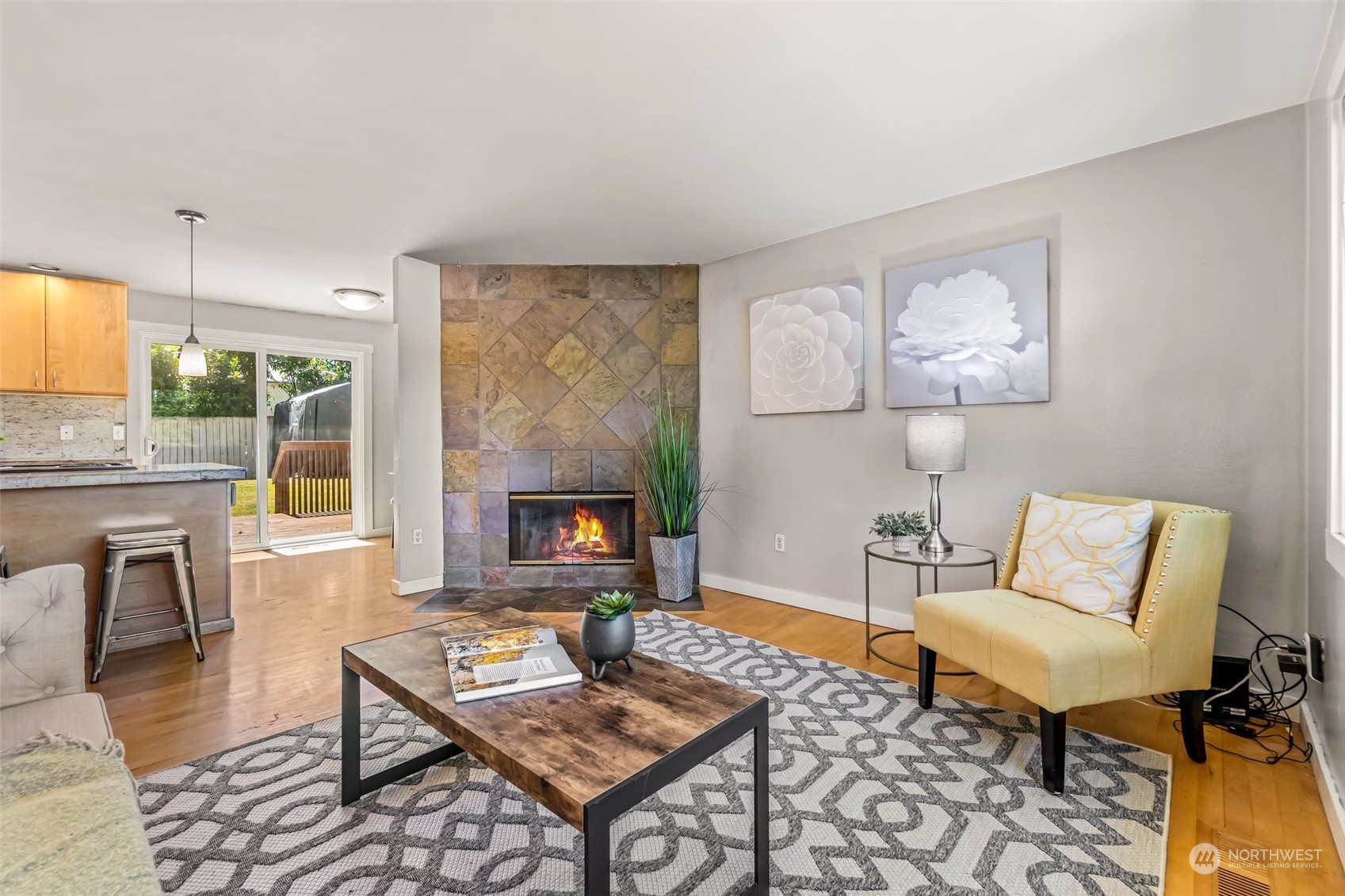 612 219th Place Southwest Bothell, WA 98021 - Photo 7 of 32 a living room with furniture and a fireplace