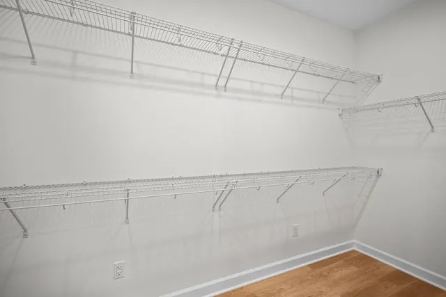 a view of a room with racks on the wall