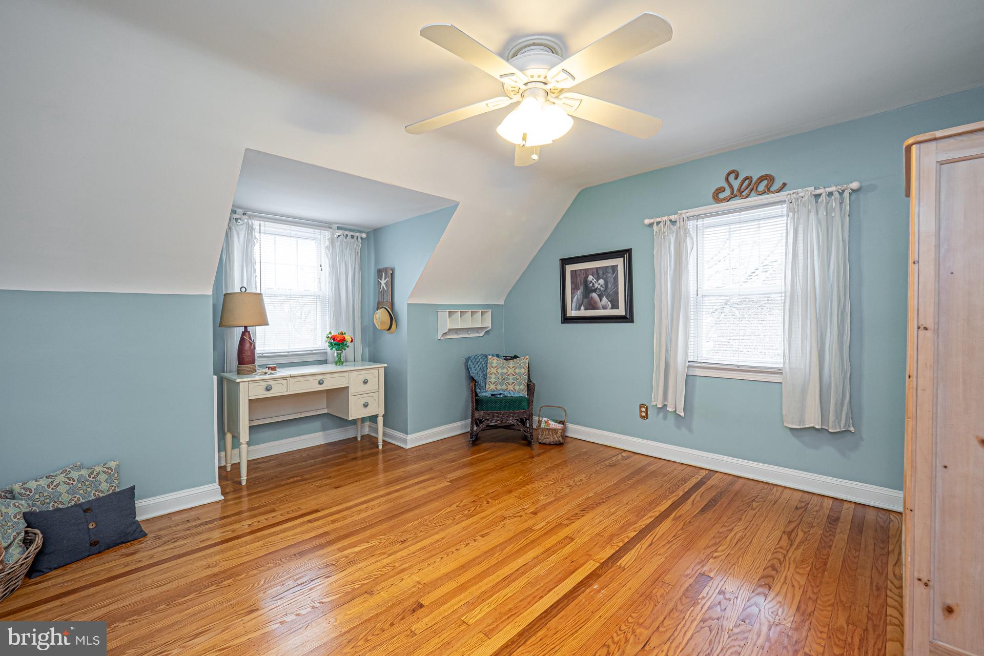 929 Westfield Road Springfield, PA 19064 - Photo 22 of 28 wooden floor in an empty room with a window