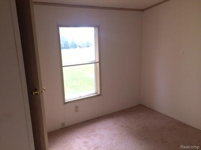 495 West Millington Road Fostoria, MI 48435 - Photo 18 of 29 bed 2.jpg