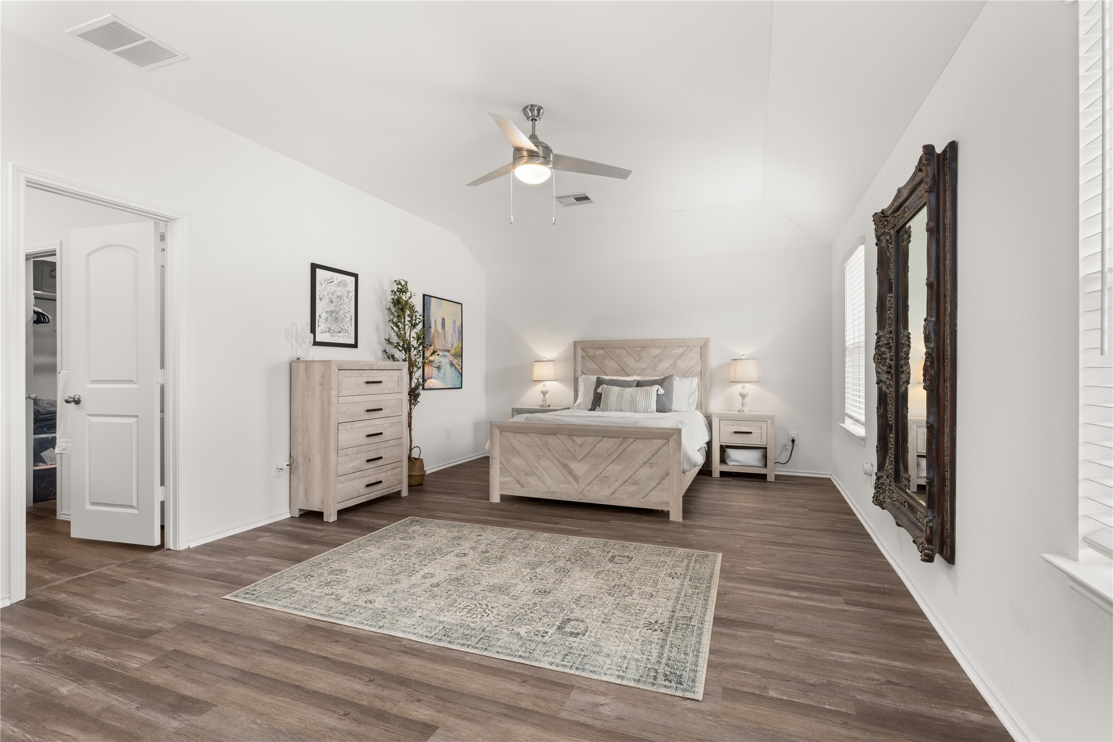 18771 Goldbach Road New Caney, TX 77357 - Photo 15 of 38 This expansive primary suite is located in the back of the home and has plenty of space for furniture & a seating area.