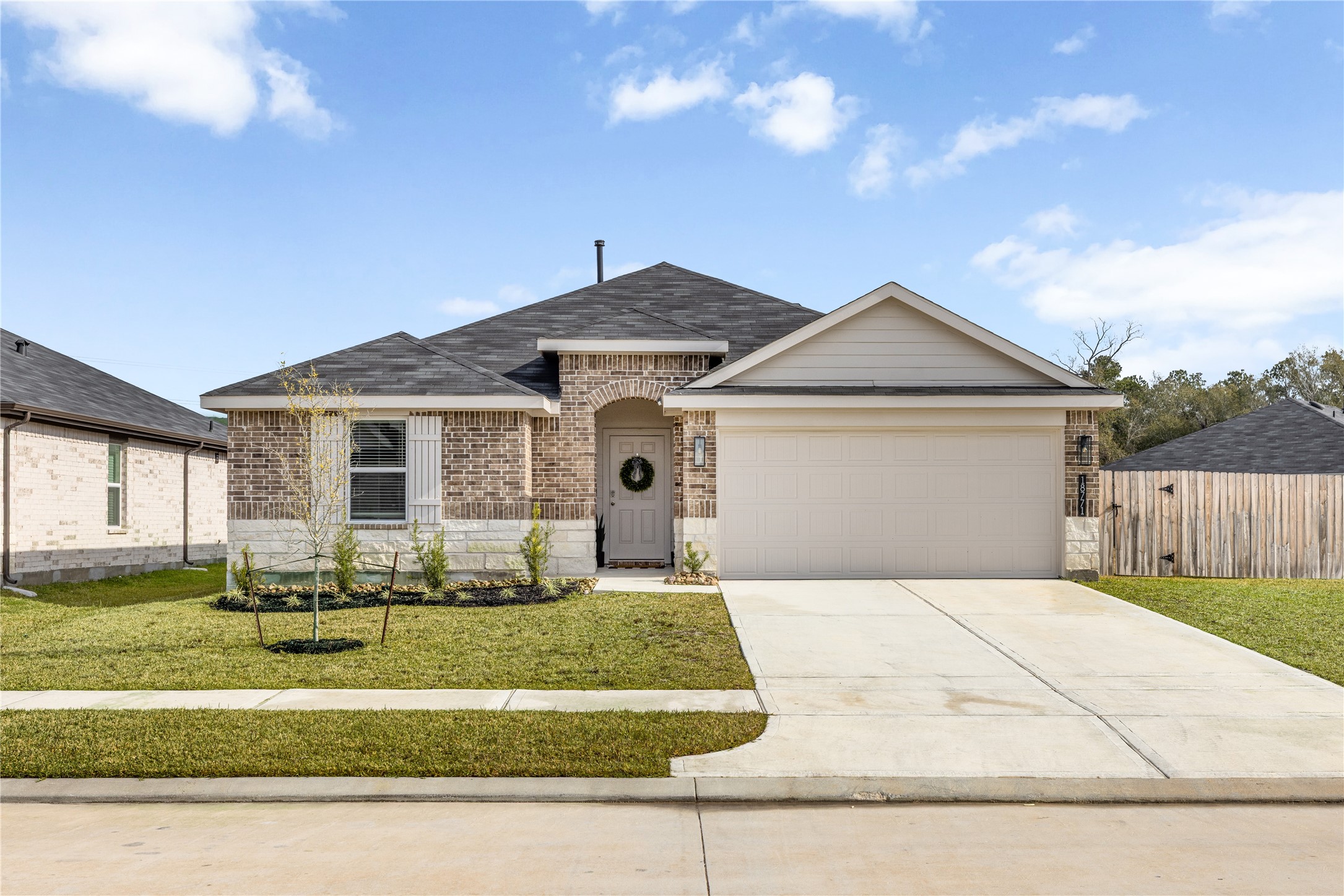 18771 Goldbach Road New Caney, TX 77357 - Photo 2 of 38 This single-story brick w/ stone elevation is gorgeous!
