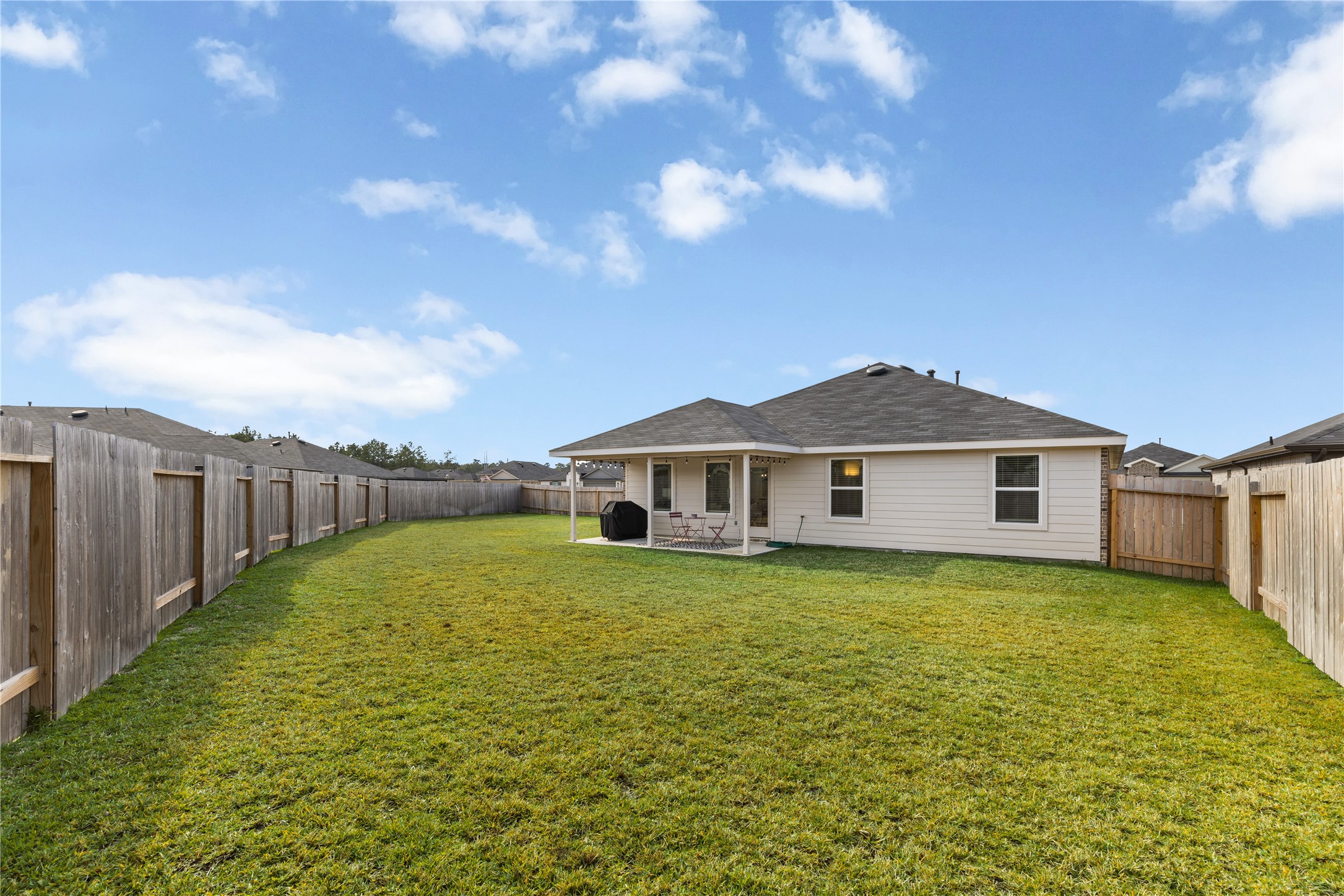 18771 Goldbach Road New Caney, TX 77357 - Photo 33 of 38 The sprinkler system will keep your grass looking healthy during the spring and summer months!