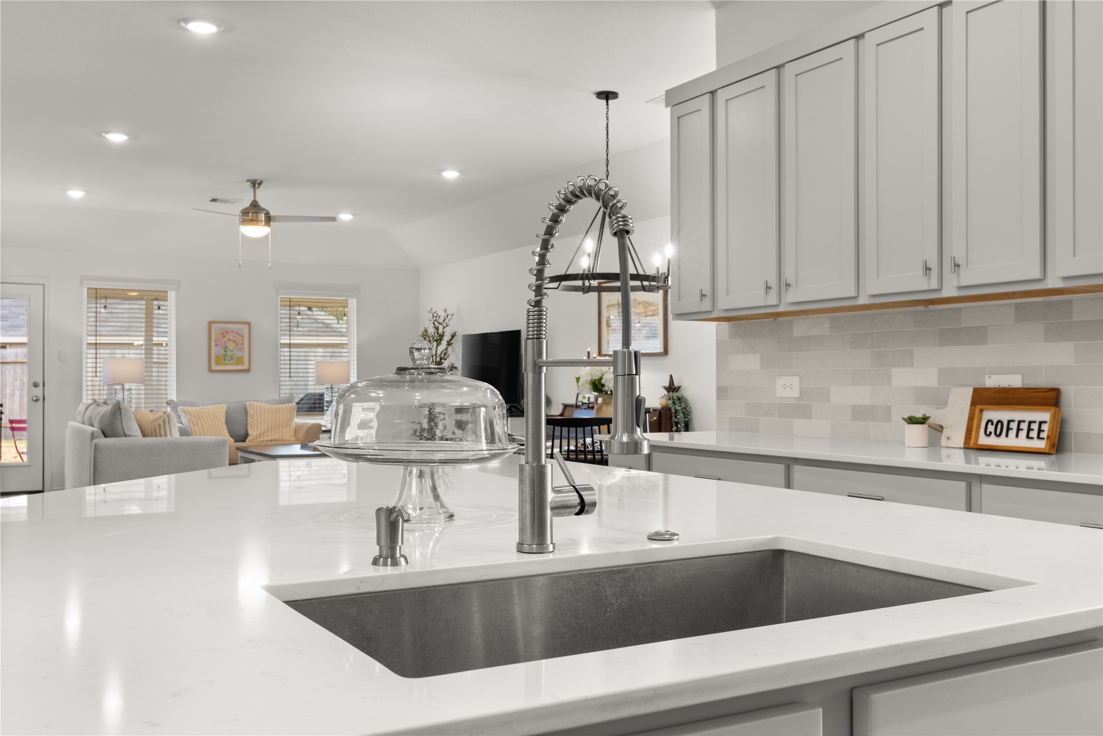 18771 Goldbach Road New Caney, TX 77357 - Photo 8 of 38 Single basin sink w/ built in soap dispenser & sleek built in push button garbage disposal.