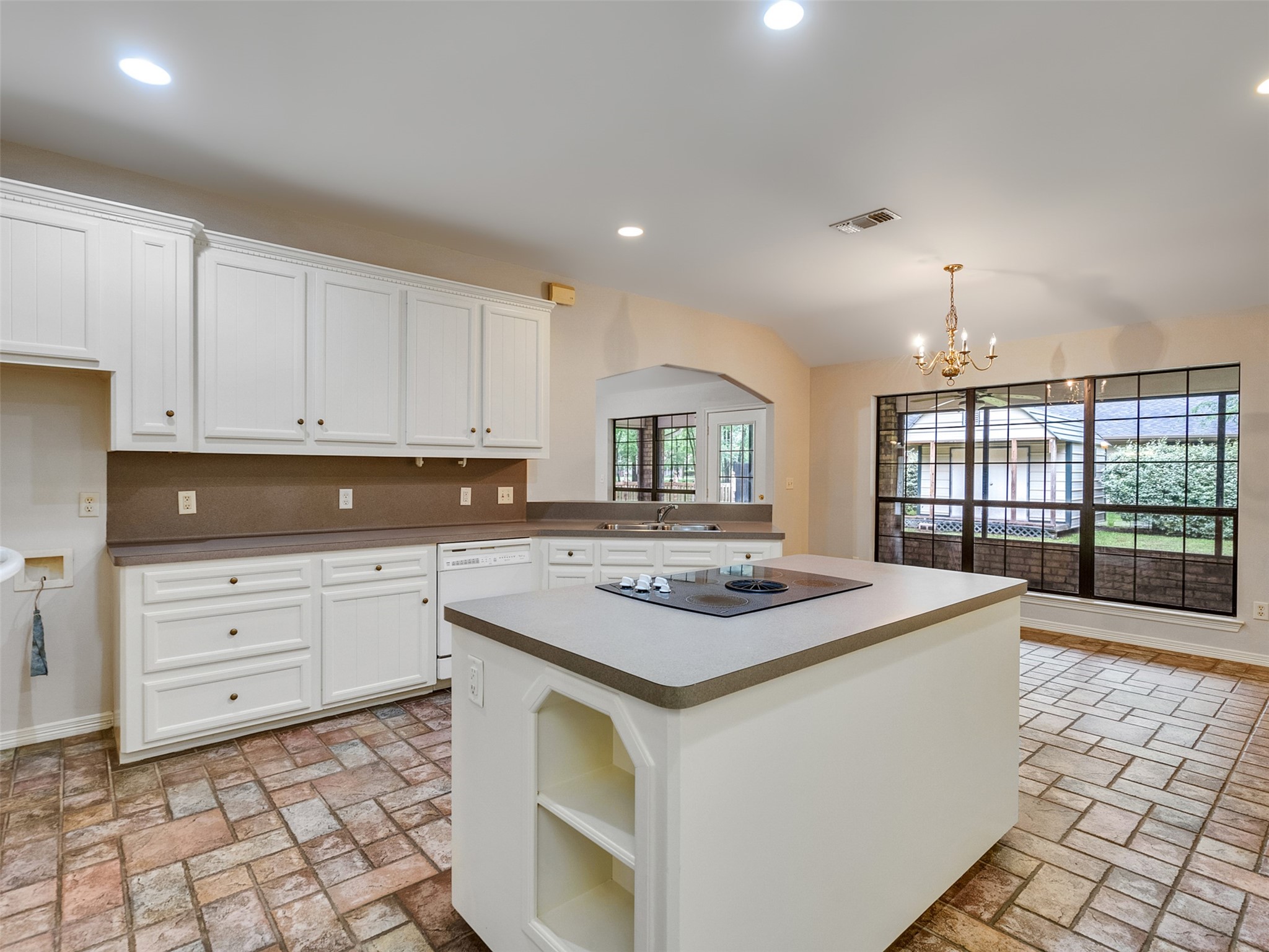 195 Coral Gables Trinity, TX 75862 - Photo 16 of 50 a kitchen that has a sink and a stove in it