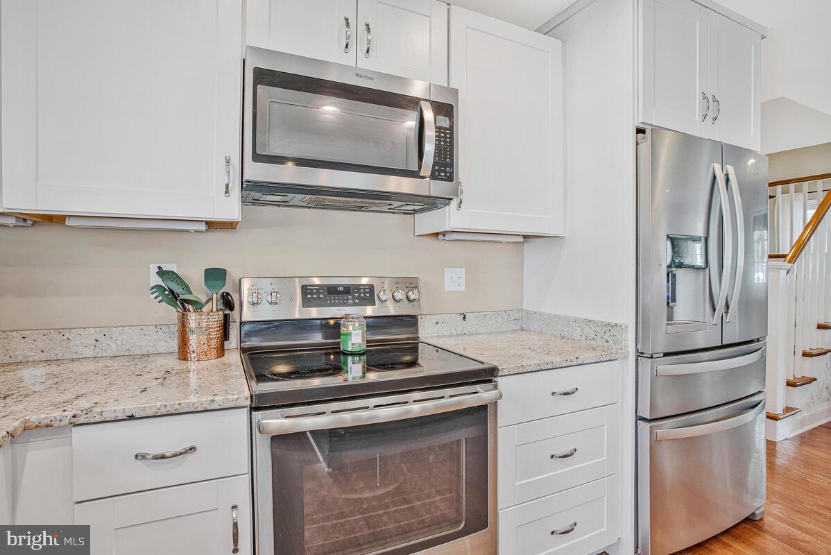 1168 Maple Avenue Shady Side, MD 20764 - Photo 13 of 52 Modern kitchen with sleek finishes.