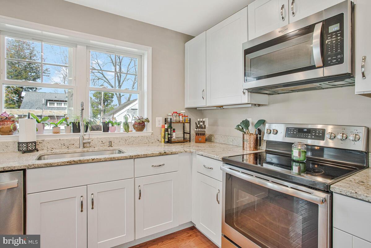 1168 Maple Avenue Shady Side, MD 20764 - Photo 14 of 52 Bright and modern kitchen with natural light.